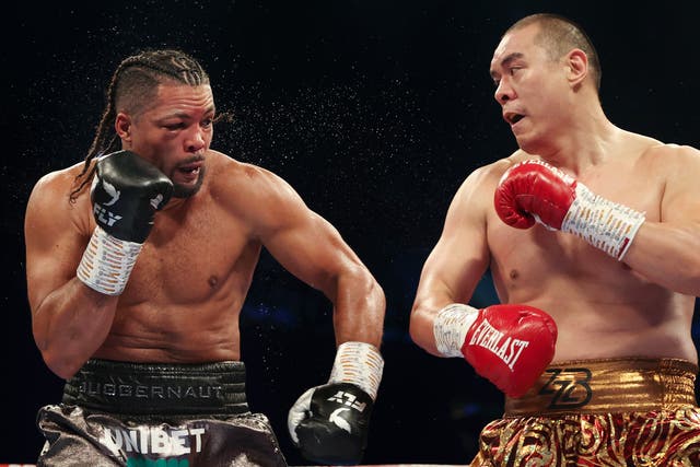 <p>Joe Joyce (left) during his defeat by Zhilei Zhang in April</p>