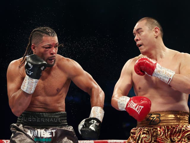 <p>Joe Joyce (left) during his defeat by Zhilei Zhang in April</p>