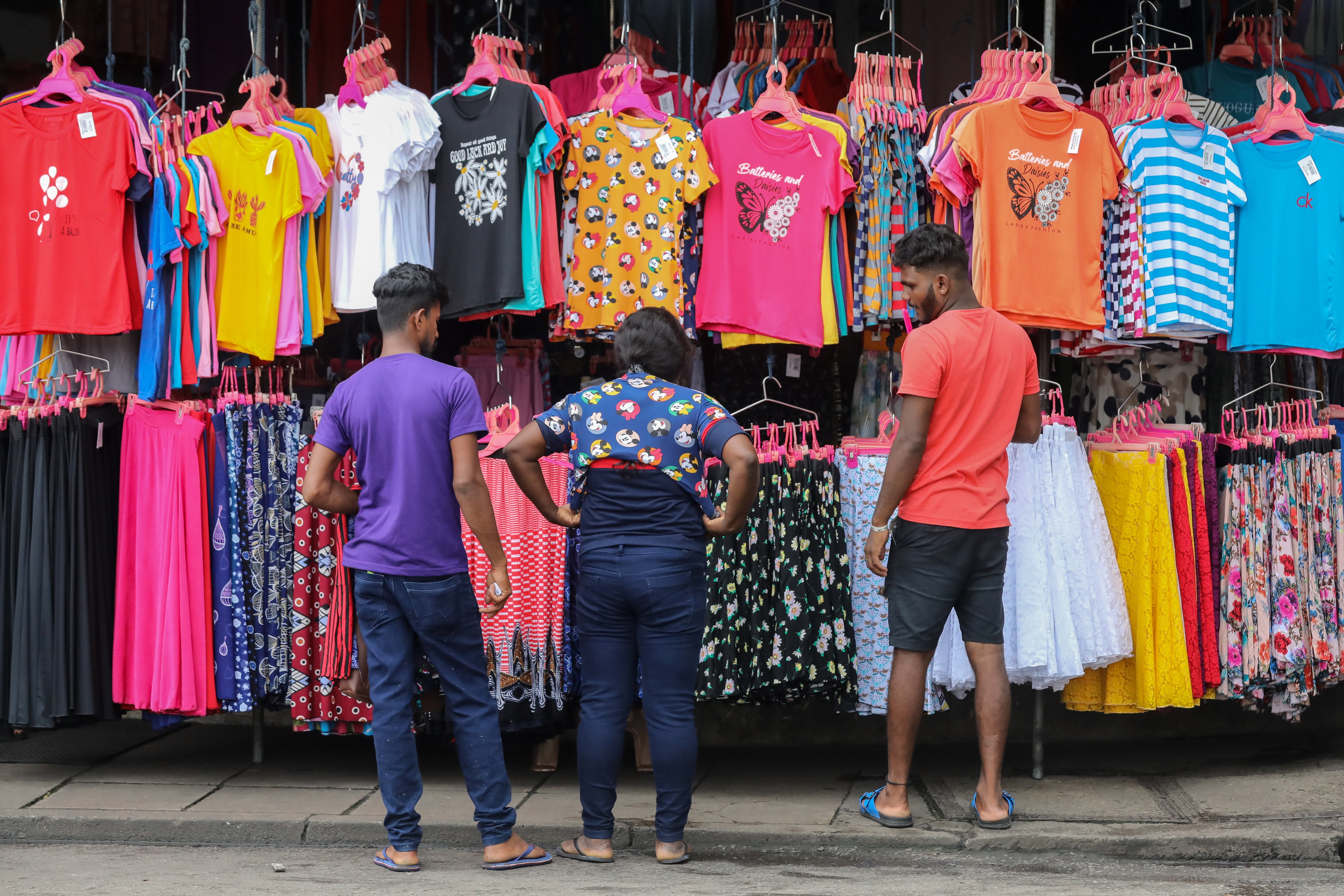 Shoppers choose clothes in Colombo, Sri Lanka