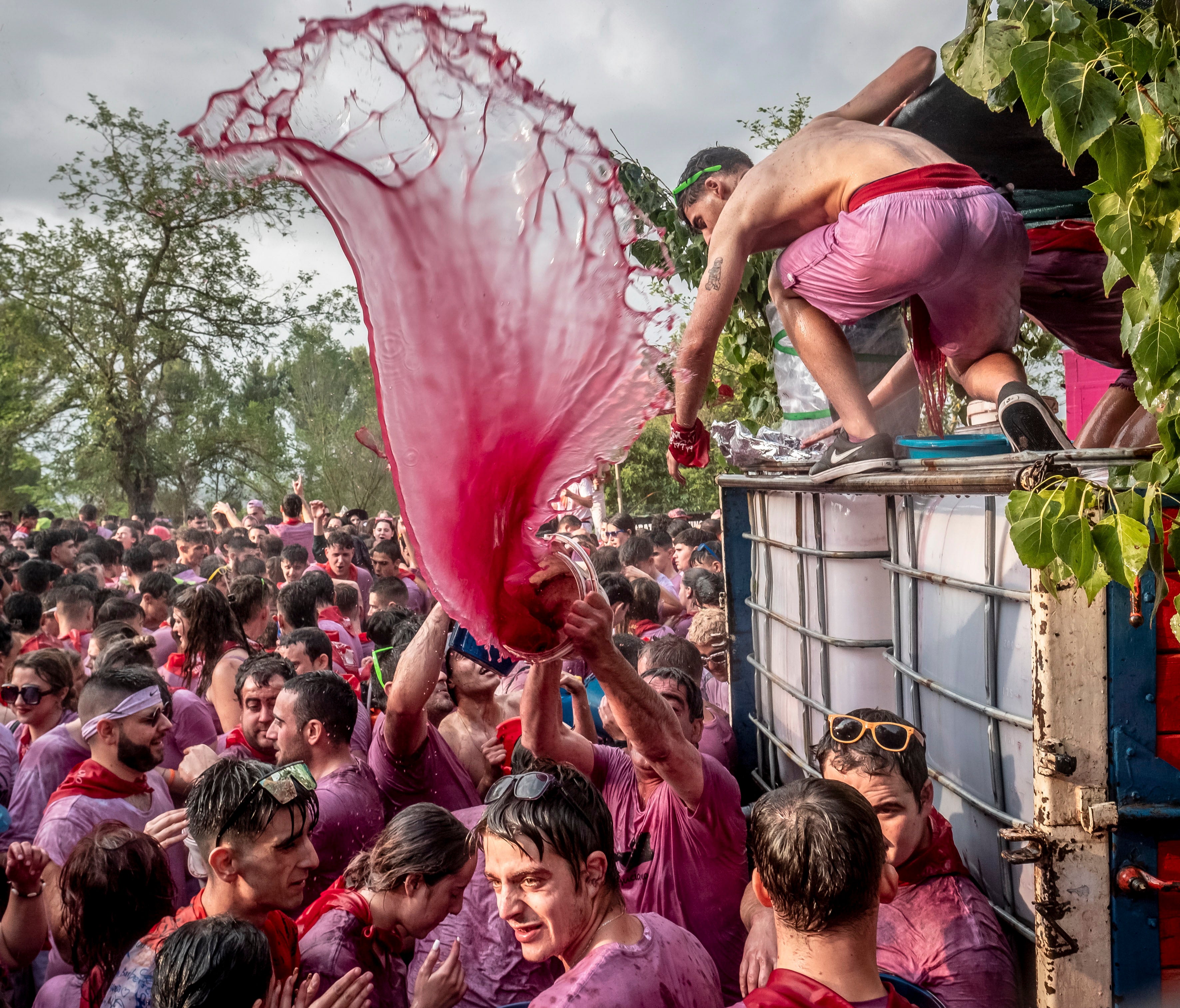 People take part in the traditional 'Wine Battle' in the village of Haro, in La Rioja, northern Spain