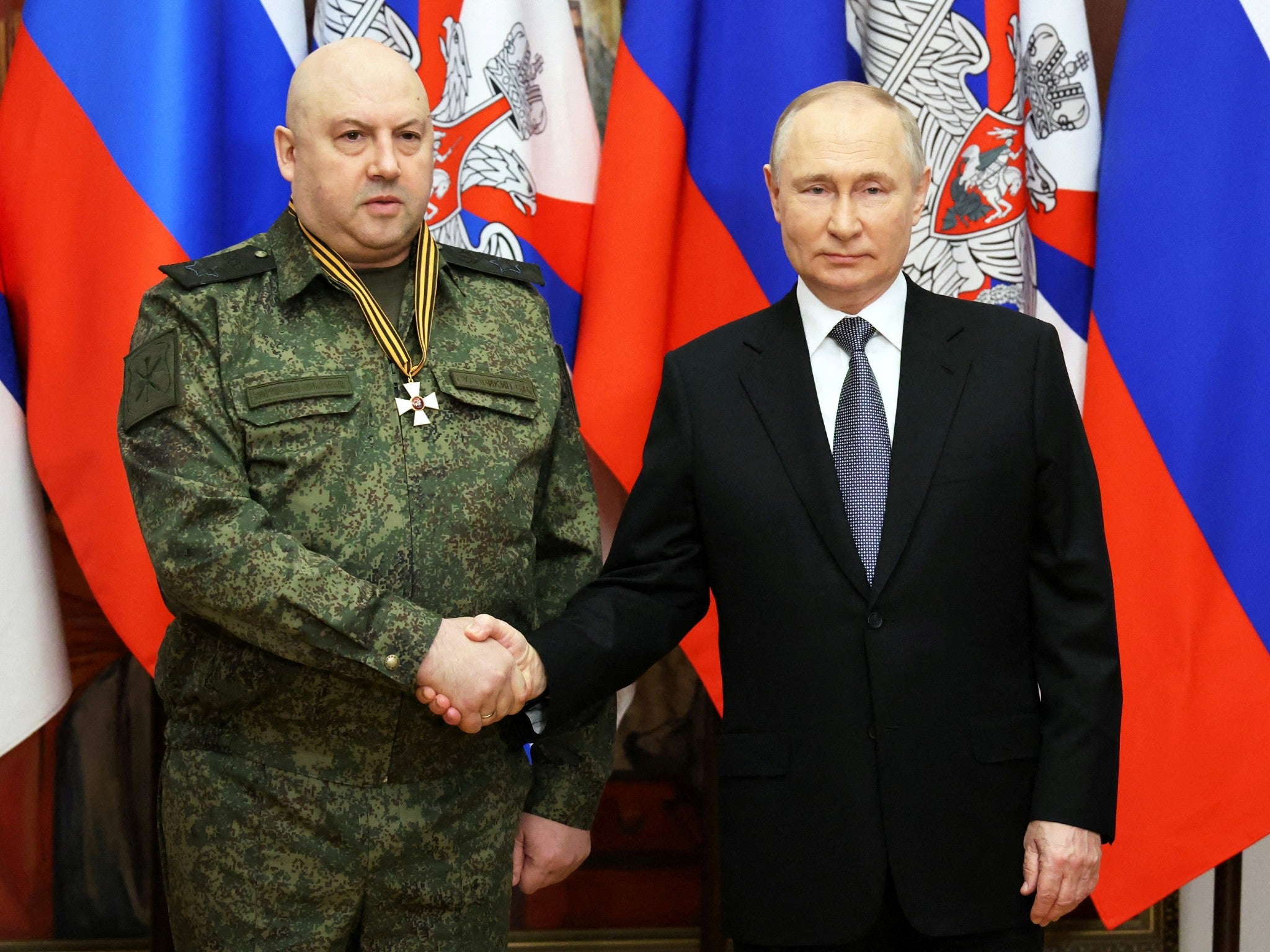 Russian president Vladimir Putin awards a medal to General Sergei Surovikin last December