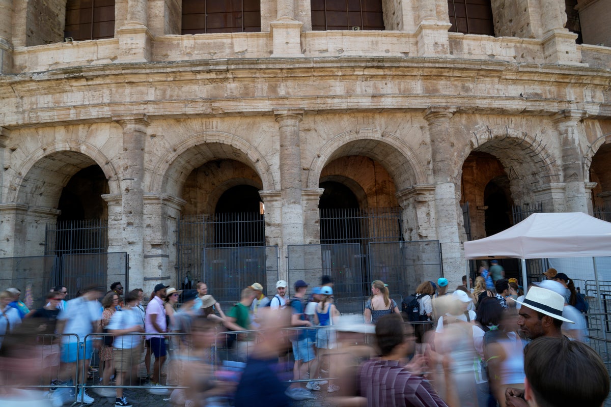 Italian police say the man filmed carving his name on the Colosseum is a tourist living in Britain