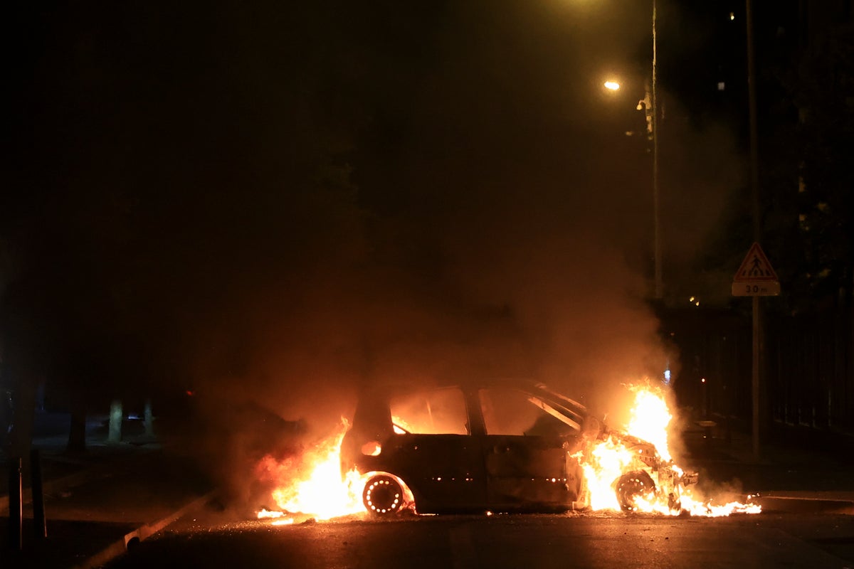 Paris riots – latest: UK issues France travel warning after looting across city