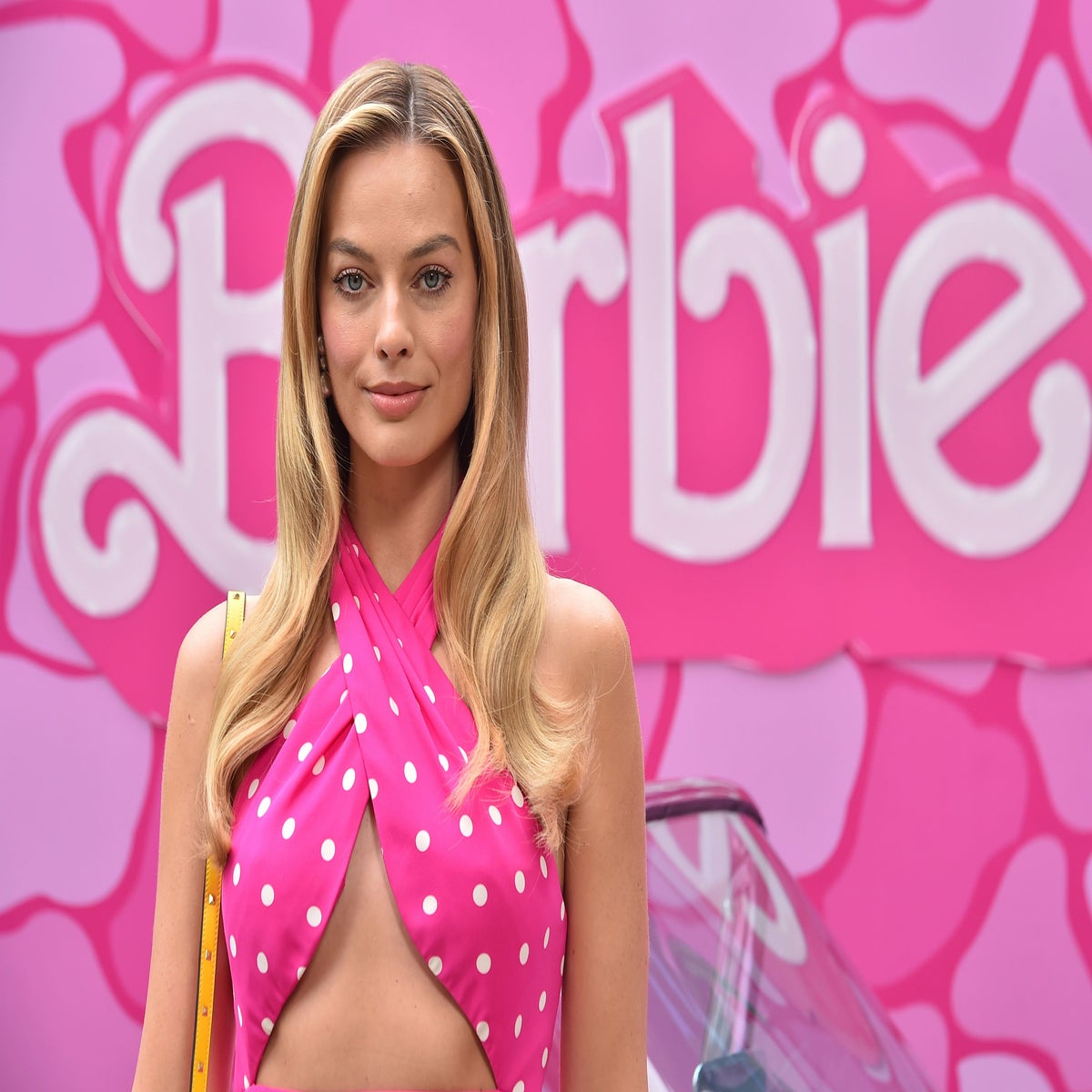 Margot Robbie Wears Vintage Versace for 'Barbie' Press Tour – WWD