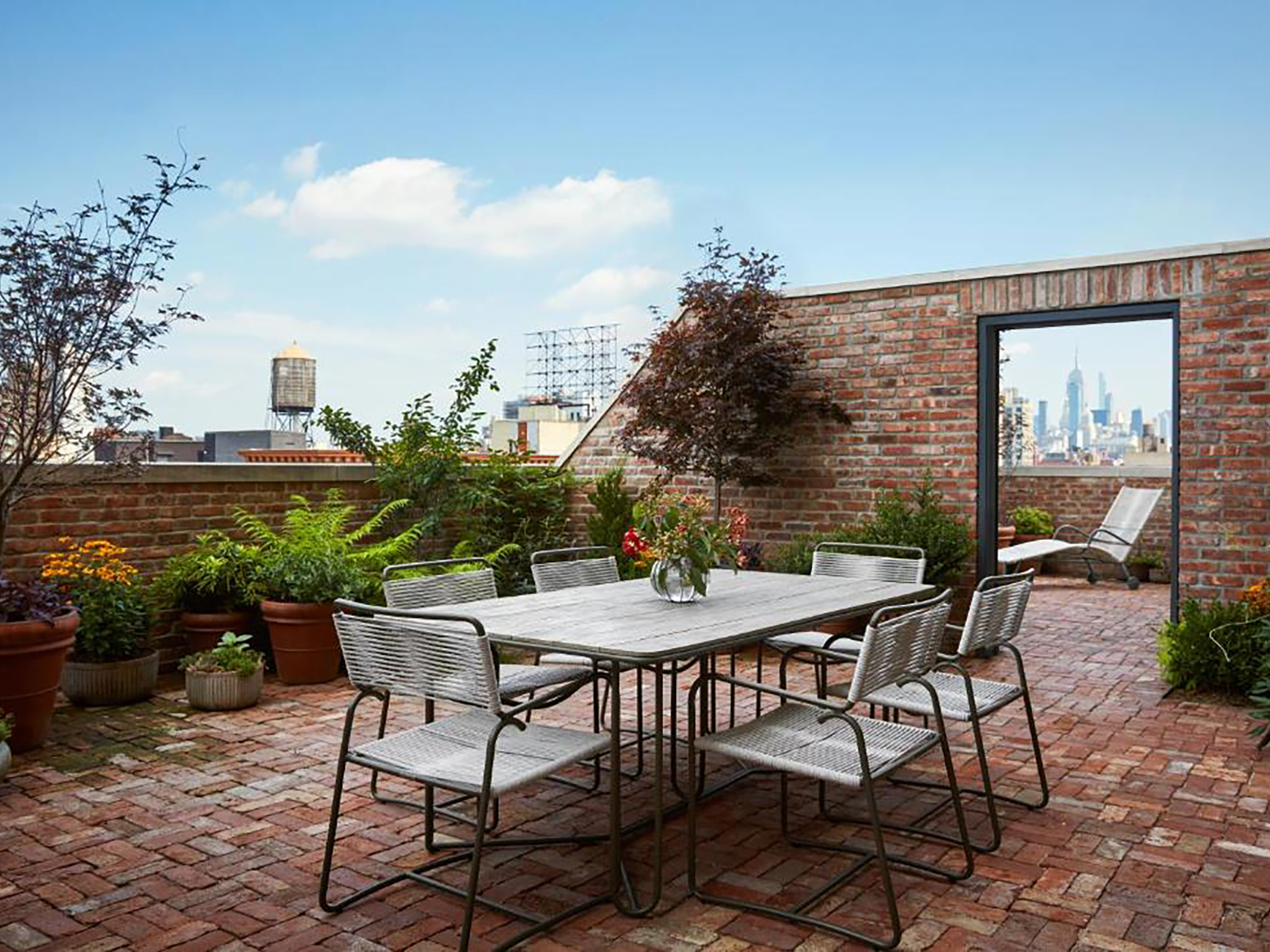 The Nine Orchard’s terrace has a spectacular view of the NYC skyline