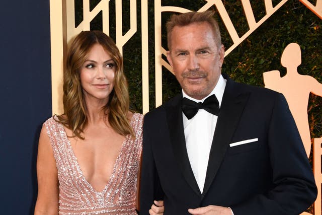 <p> Kevin Costner and his wife Christine Baumgartner arrive for the 28th Annual Screen Actors Guild (SAG) Awards at the Barker Hangar in Santa Monica, California, on February 27, 2022</p>