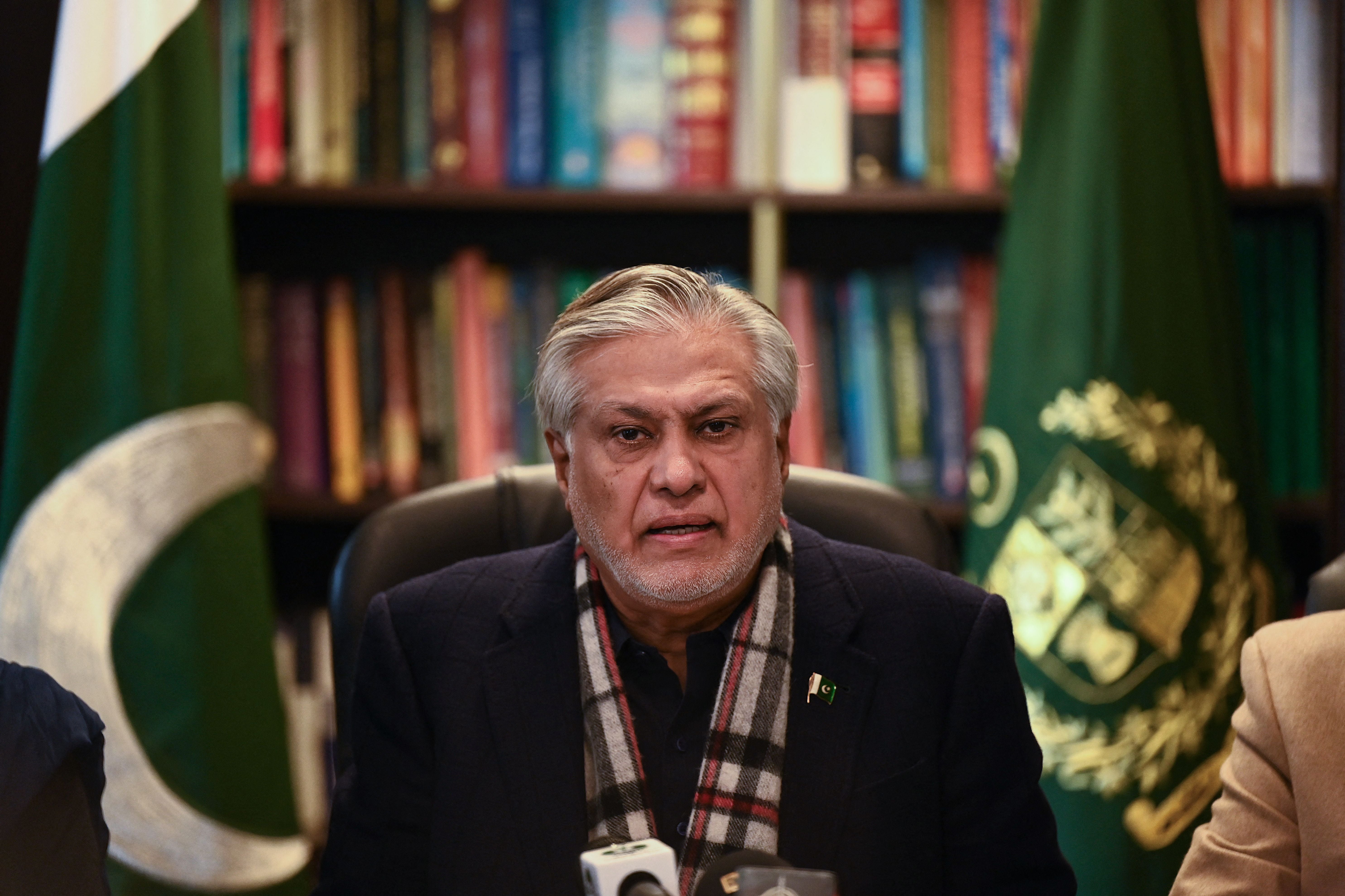 Pakistans finance minister Ishaq Dar speaks during a press conference in Islamabad