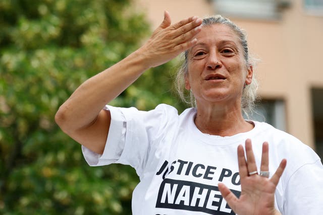 <p>Mounia attended a march in tribute to her son in Nanterre</p>