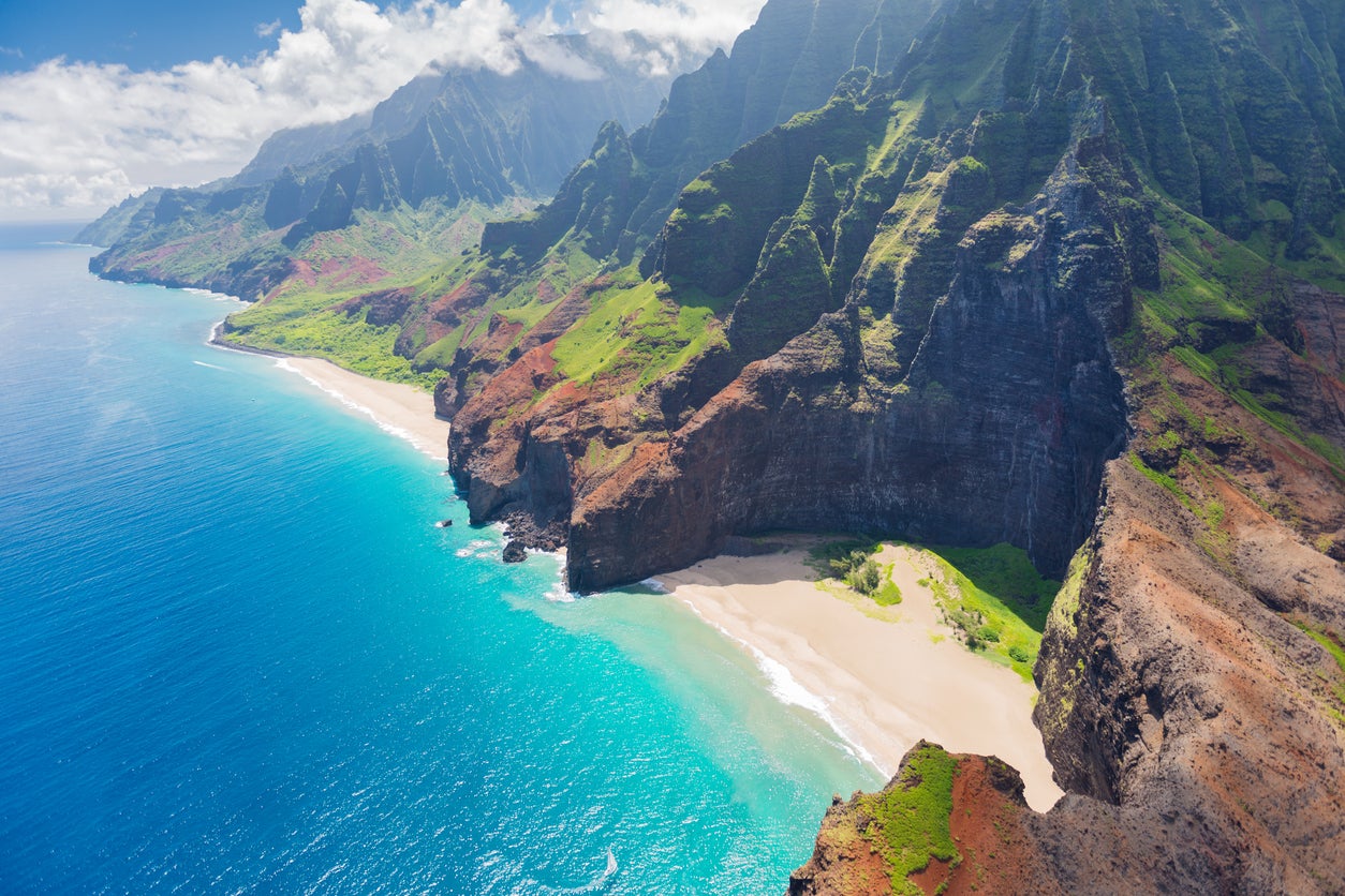 The mountainous terrain near Kauai, Hawaii’s Na Pali coast. A helicopter operated by Ali’i Kauai Air Tours and Charters crashed off the Na Pali coast on July 11, leaving one person dead and two others missing (stock image)