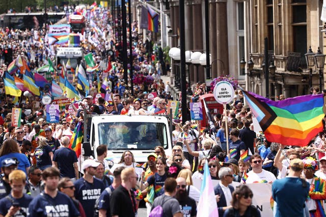 <p>Members of the LGBT+ community take part in the annual Pride Parade in the streets of London</p>