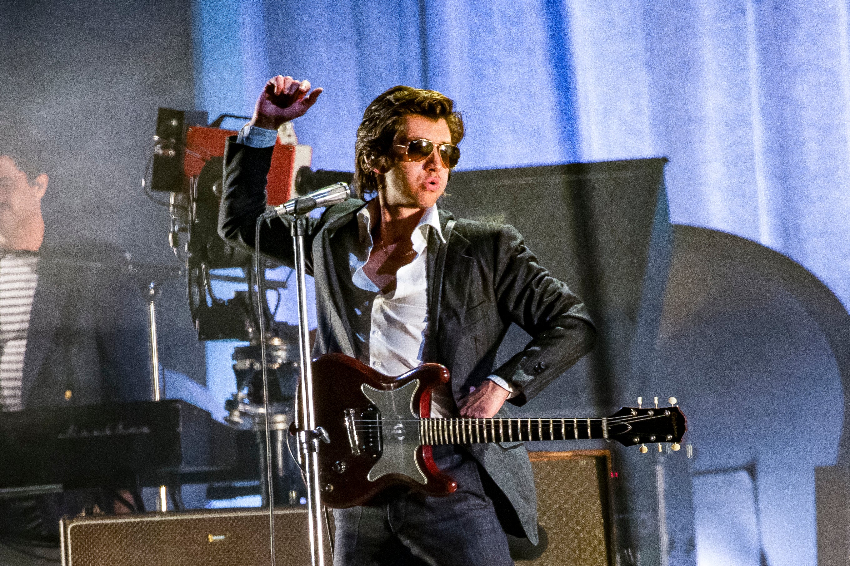One for the road... Alex Turner has sex apeel at Glastonbury with the Arctic Monkeys
