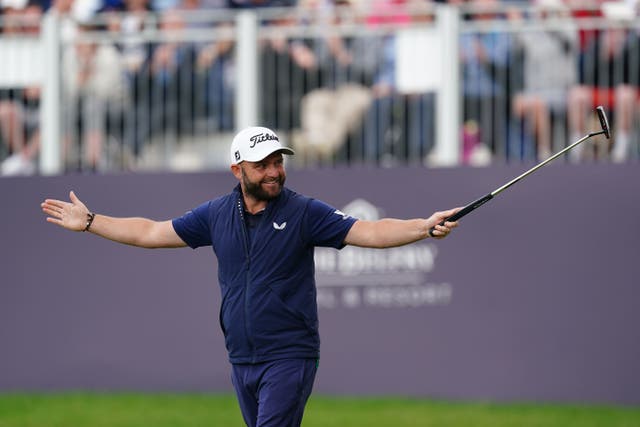 England’s Andy Sullivan celebrates making a birdie on the 18th hole in round three of the Betfred British Masters at The Belfry (David Davies/PA)
