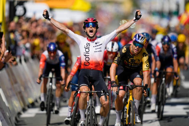 <p>Victor Lafay celebrates winning stage two of the Tour de France</p>