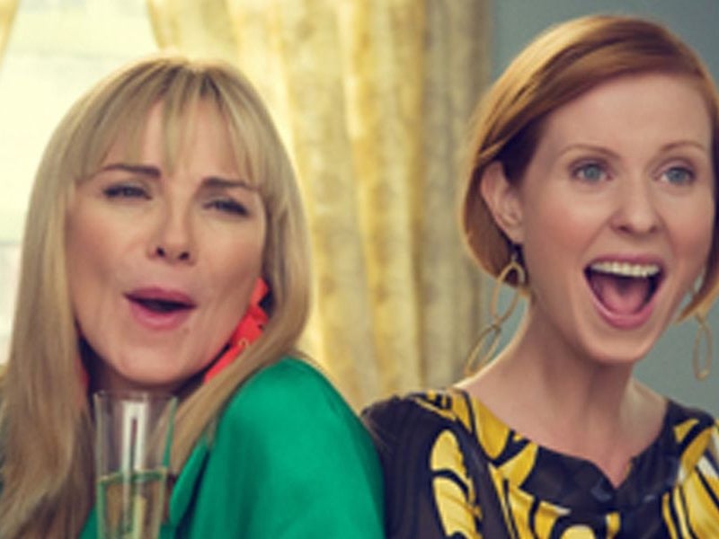 <p>Kim Cattrall and Cynthia Nixon in ‘Sex and the City’</p>