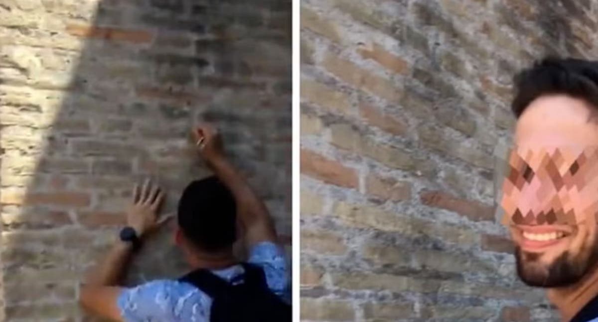 British tourist who carved name into Colosseum begs for forgiveness
