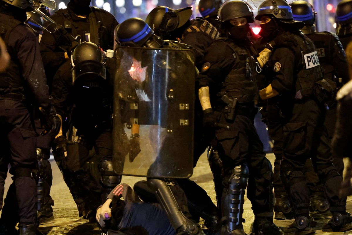 Children as young as 12 detained for attacking police – latest on Paris protests
