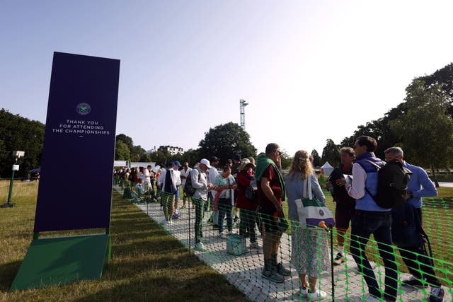 <p>Tennis fans in the Wimbledon queue on day one of the 2023 Wimbledon Championships (Steven Paston/PA)</p>