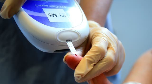 <p>A nurse carries out a diabetes test. The number of people with the condition will go up by nearly 50 per cent to 7 million over the next two decades </p>