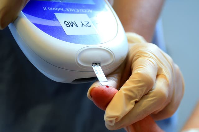 <p>A nurse carries out a diabetes test. The number of people with the condition will go up by nearly 50 per cent to 7 million over the next two decades </p>