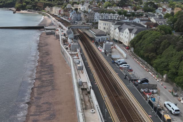 The opening of a new railway station and completion of a sea wall show the Government is “investing in vital infrastructure”, a Cabinet minister said (Network Rail/PA)
