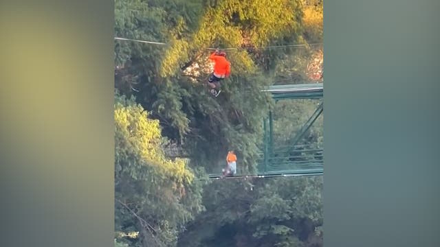 <p>Terrifying moment six-year-old falls from zipline into lake</p>