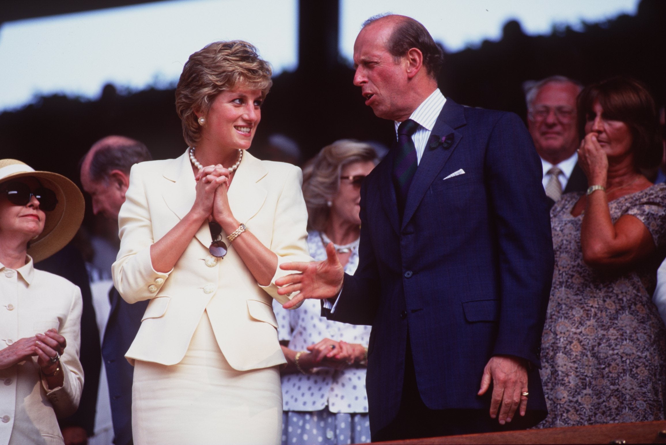 Diana, Princess of Wales, chats with the Prince of Kent at Wimbledon 1995