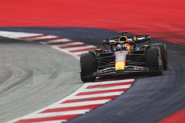 <p>Max Verstappen runs his Red Bull close to the white line during Sunday’s race</p>