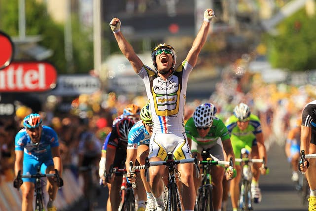 <p>Mark Cavendish celebrates wining stage five of the 2010 Tour in Montargis</p>