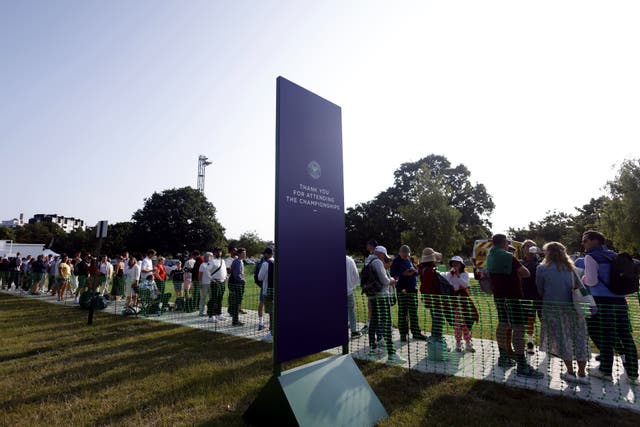 Tennis fans in the Wimbledon queue on day one (Steven Paston/PA)