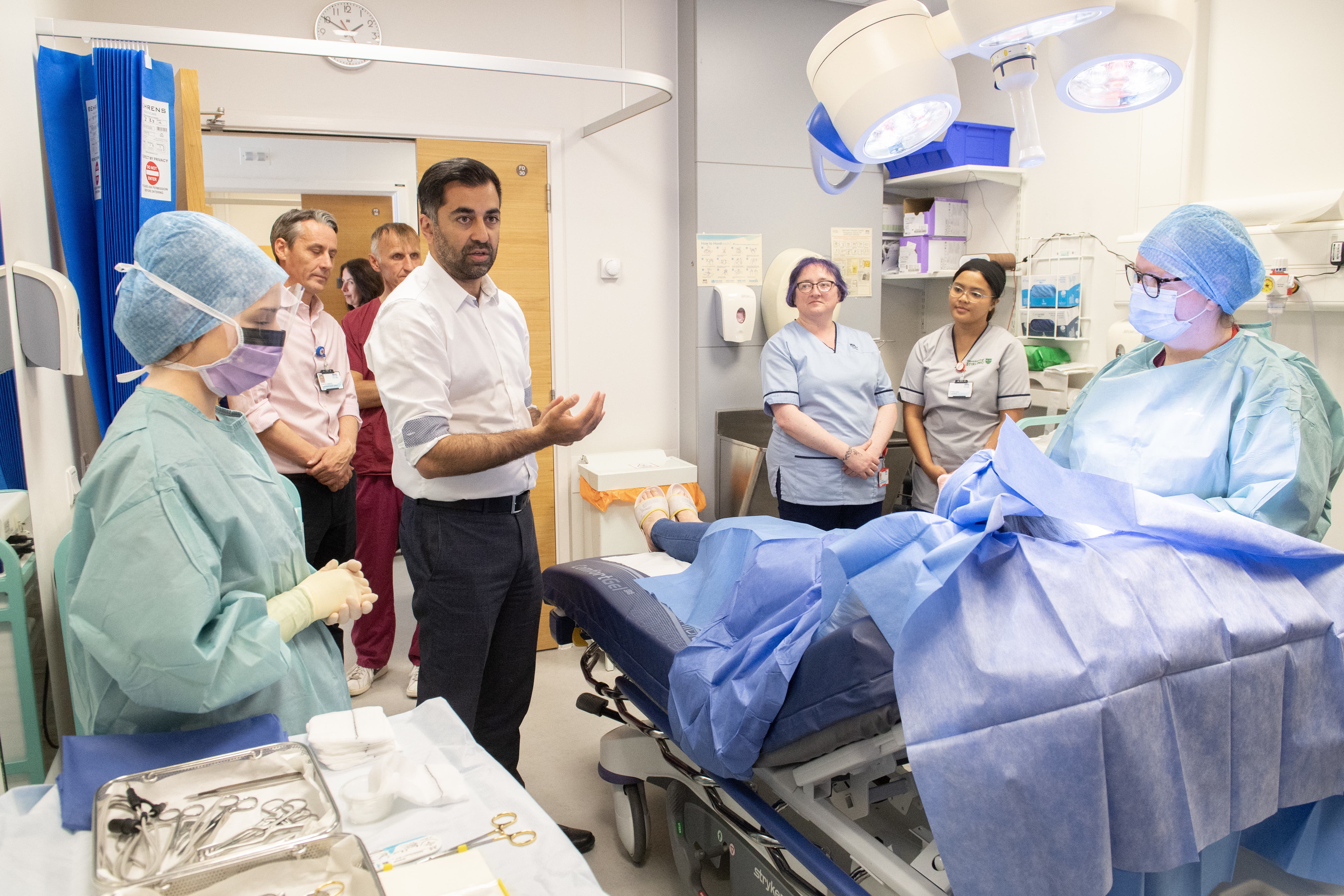 First Minister Humza Yousaf meets patient Catherine Esplin during a visit to NHS Forth Valley Royal Hospital in Larbert (Lesley Martin/PA)