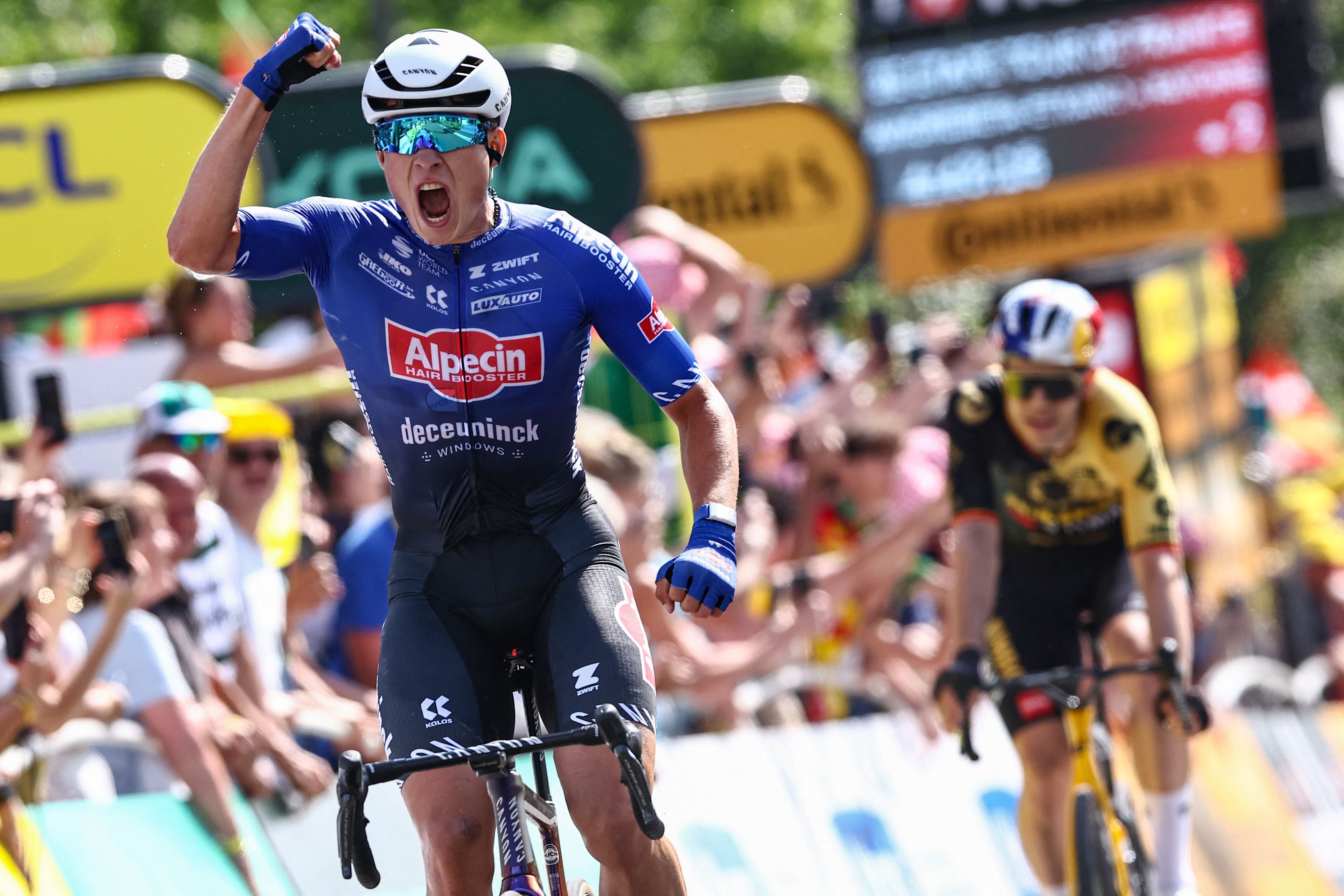 Jasper Philipsen celebrates victory on stage three of the Tour de France