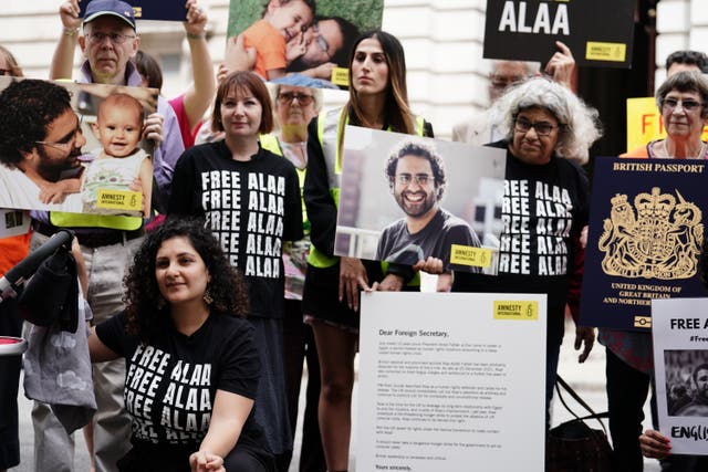 Alaa Abd El-Fattah’s sister Mona Seif and mother Laila Soueif took part in a vigil in London for the jailed pro-democracy activist (Jordan Pettitt/PA)