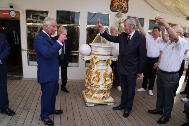 Members of the Royal Yacht Britannia toast the King (Andrew Milligan/PA)