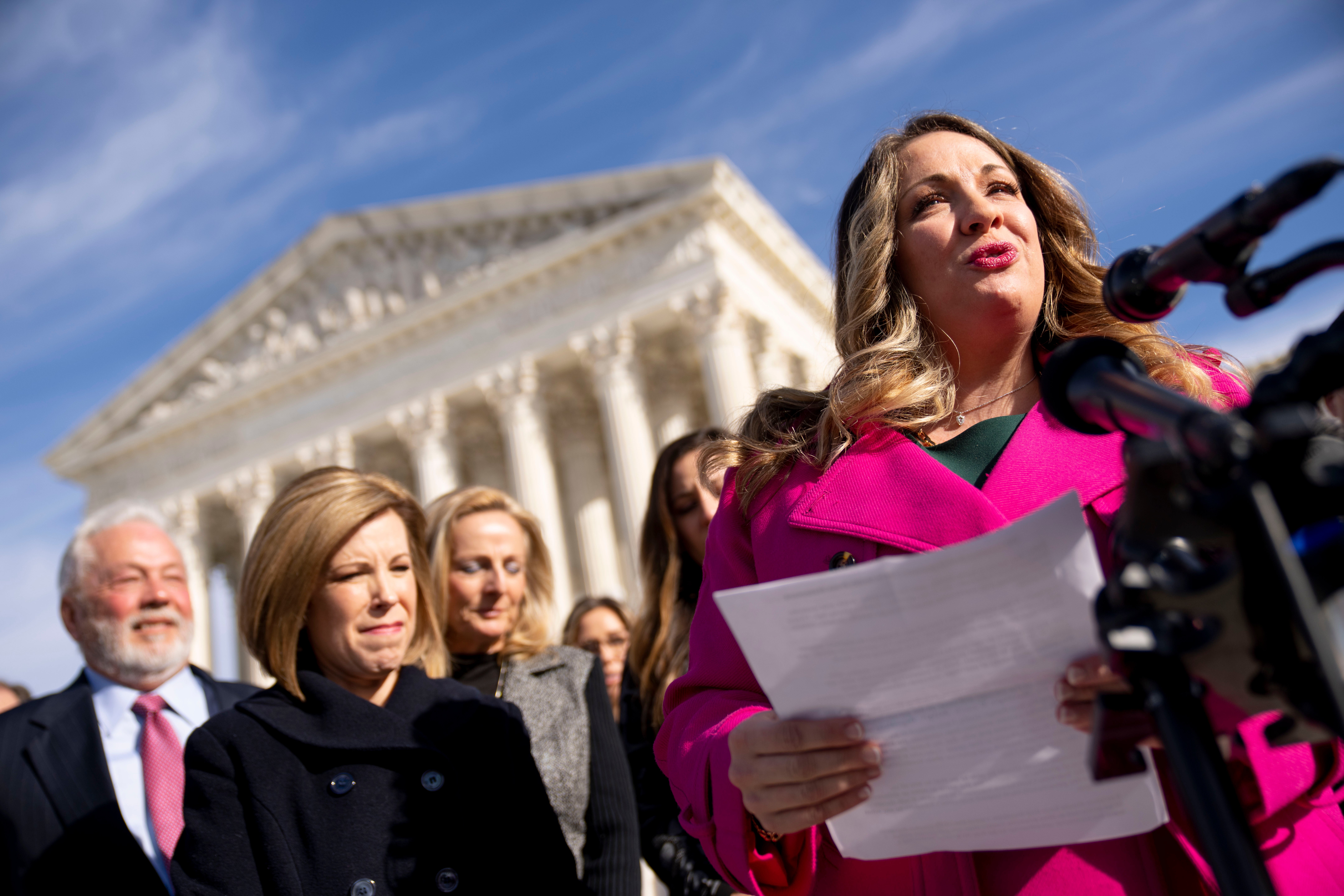 Lorie Smith speaks outside the Supreme Court in December 2022.