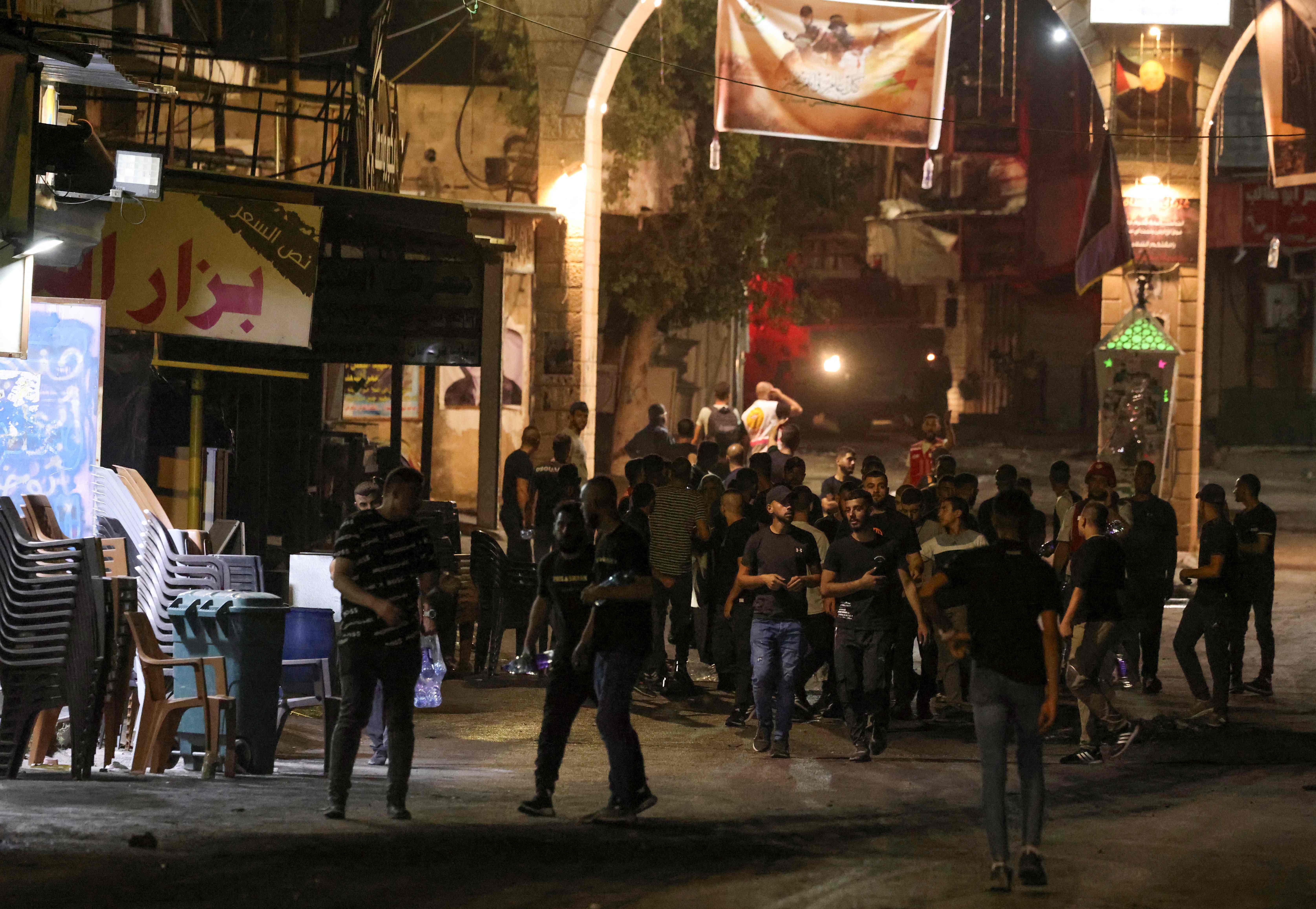 Residents evacuate the Jenin refugee camp during an Israeli military operation in the occupied West Bank