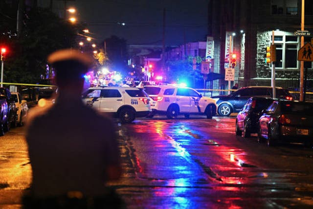 <p>Police work the scene of a shooting on 3 July 2023 in Philadelphia, Pennsylvania</p>