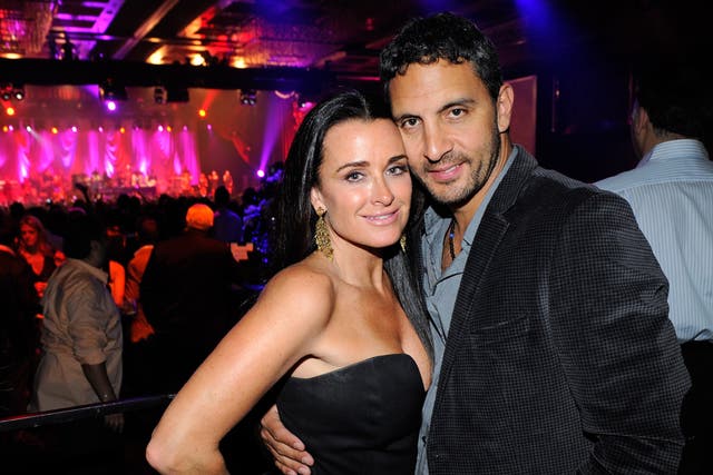 <p>Kyle Richards and her husband Mauricio Umansky attend recording artist Stevie Wonder’s concert at The Chelsea at The Cosmopolitan of Las Vegas on New Year’s Eve December 31, 2011 </p>