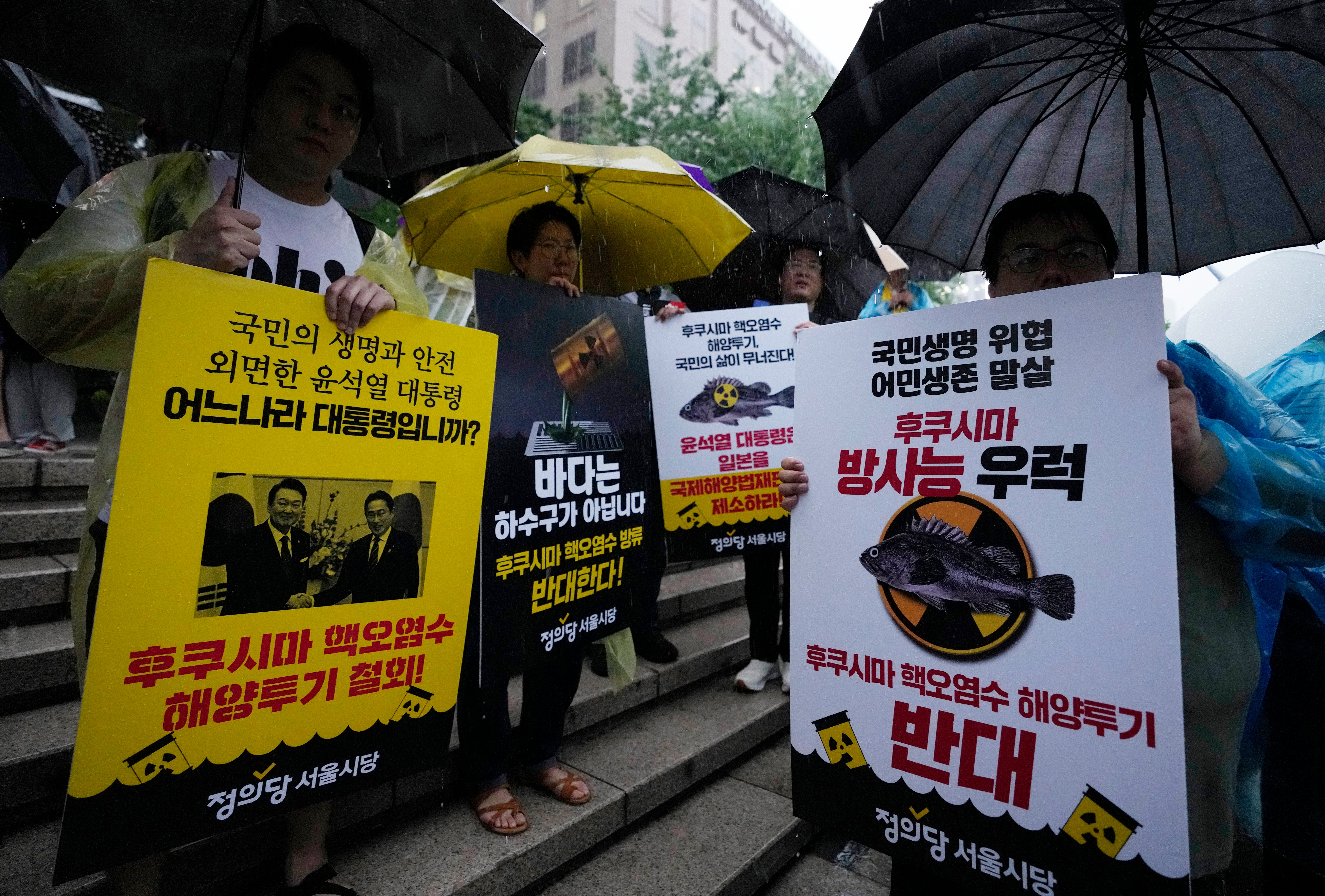 Protesters attend a rally against the Japanese government’s decision to release treated radioactive wastewater from the Fukushima nuclear power plant, in Seoul