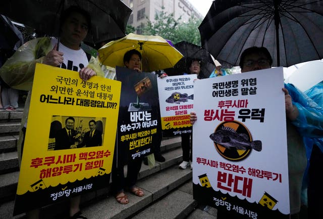 <p>Protesters attend a rally against the Japanese government’s decision to release treated radioactive wastewater from the Fukushima nuclear power plant, in Seoul</p>