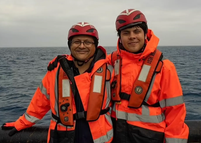 <p>Shahzada and Suleman Dawood smile in the final photo taken before their doomed dive on board the Titan submersible</p>