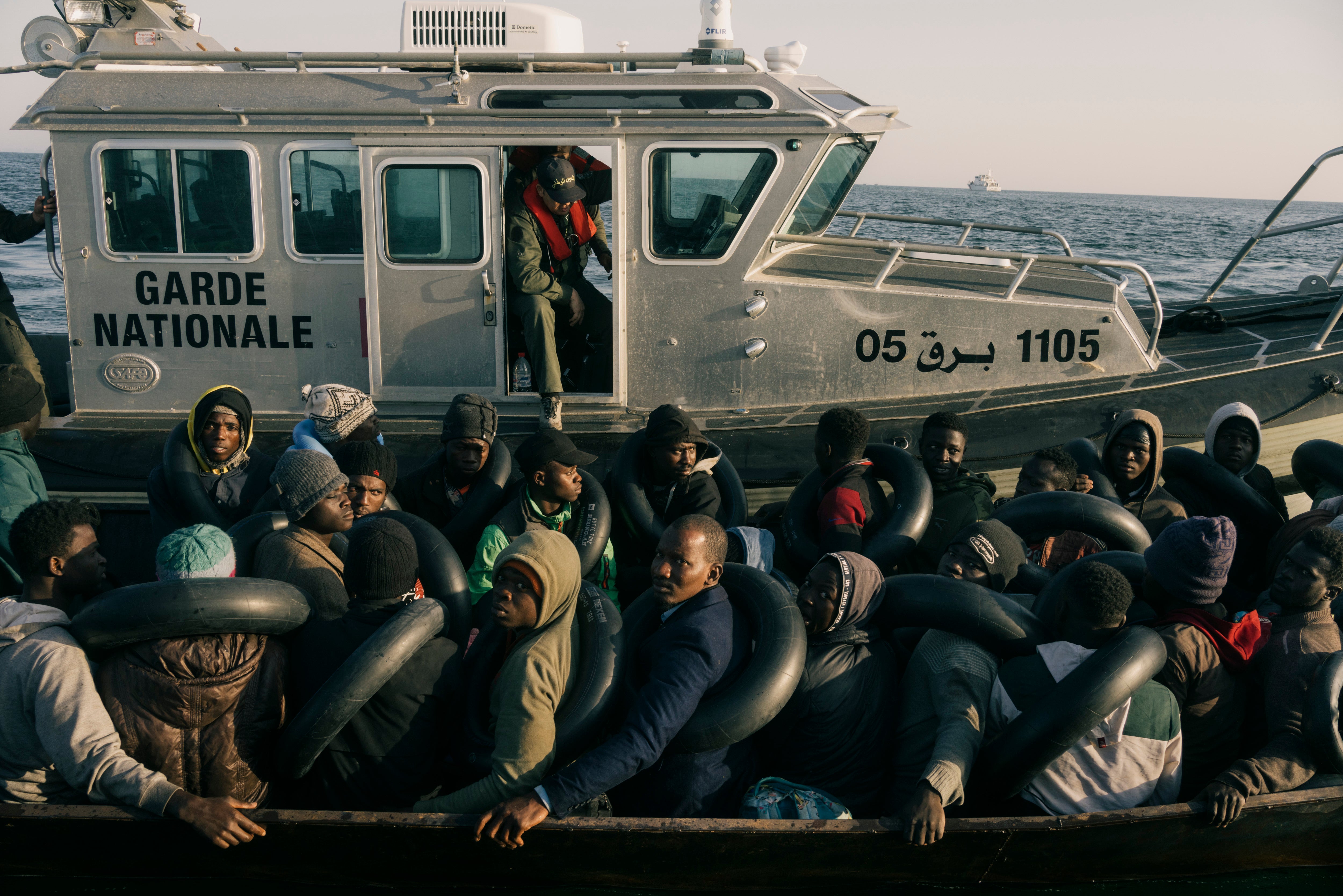 The Tunisian Coast Guard intercepts a boat of migrants near Sfax on 27 May