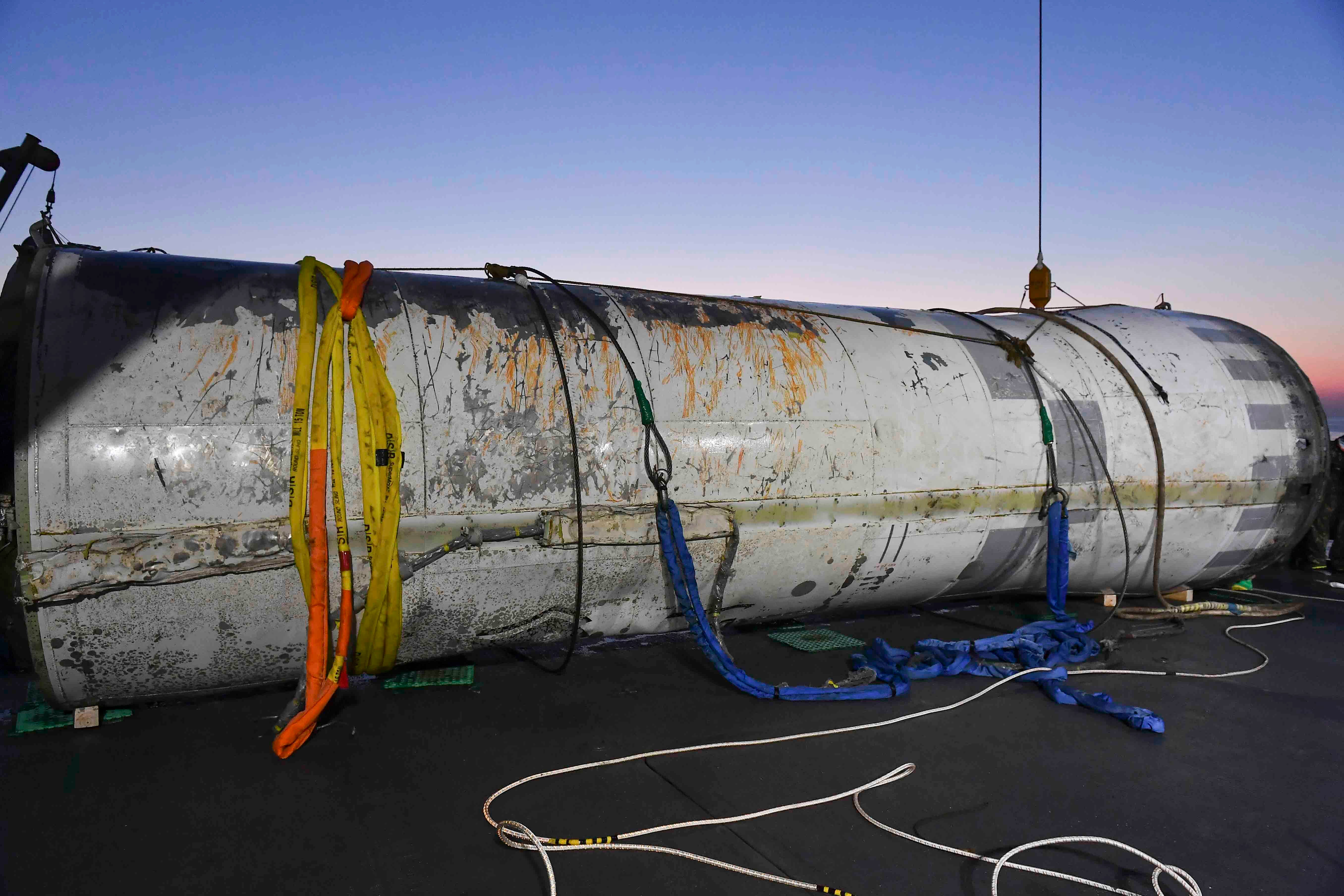 This photo provided by South Korea's Defense Ministry shows an object salvaged by South Korea's military that is presumed to be part of the North Korean space-launch vehicle