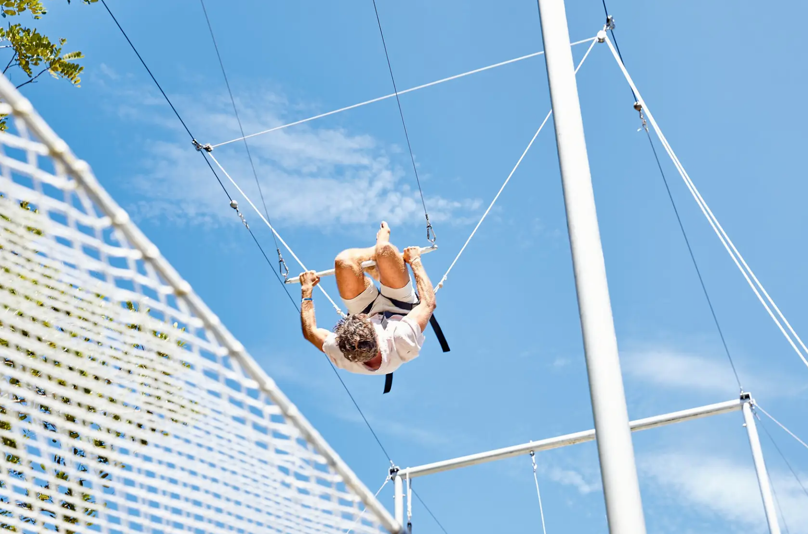 The resort’s playground, designed by Cirque du Soleil, includes a flying trapeze for kids and grown-ups alike