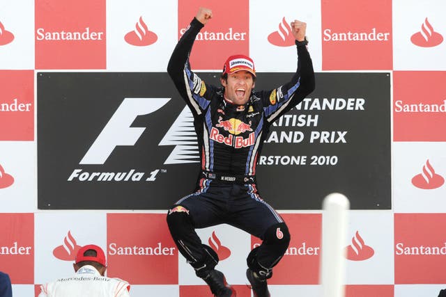 Mark Webber celebrates winning the 2010 British Grand Prix (Anna Gowthorpe/PA)