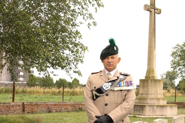 General Colin Weir visited the grave of Private Robert Morrow, who died in 1915 at Messines in Belgium at the age of 23 (MoD/PA)