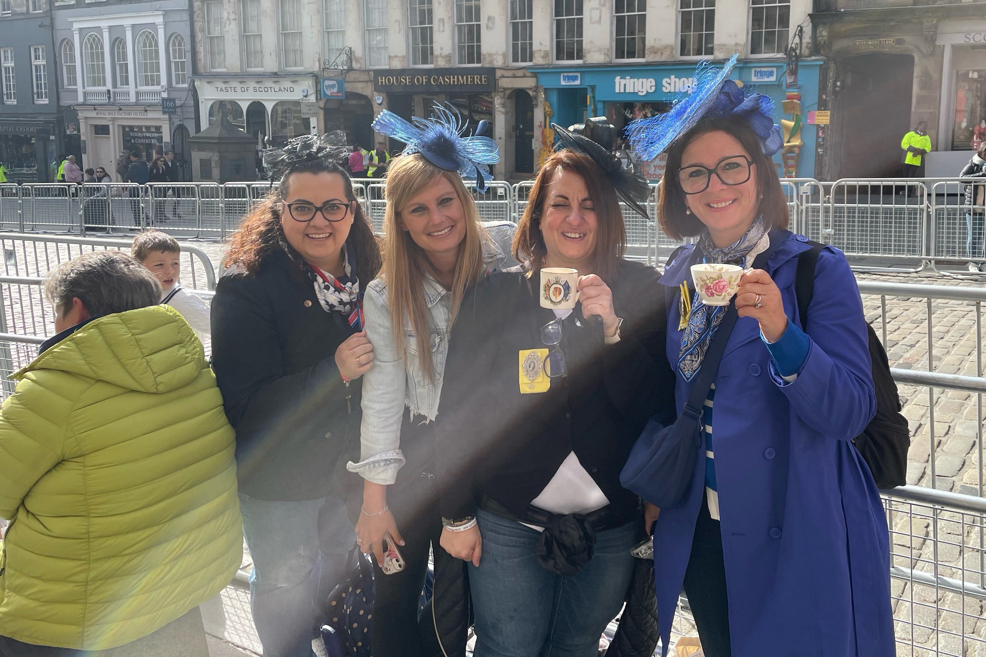 Georgia, Paula, Sara and Ciara, all from Italy, were on the Royal Mile ahead of the procession (Lauren Gilmour/PA)