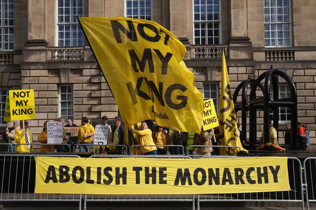 <p>Protesters holding sings titled ‘Not my King’ </p>