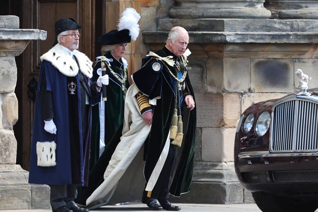 The King and Queen Camilla leaving the Palace of Holyroodhouse (Robert Perrry/PA)