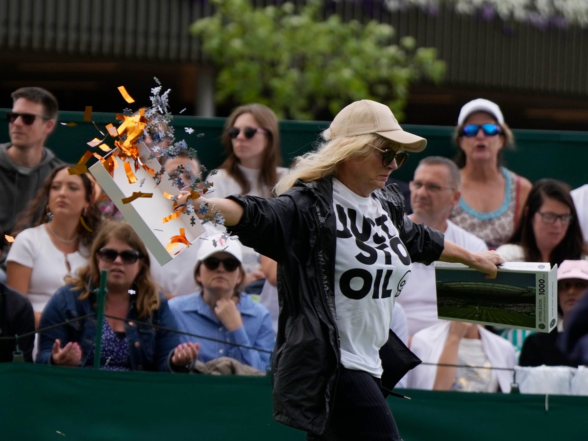 Two activists arrested after Wimbledon disrupted by Just Stop Oil protesters on court