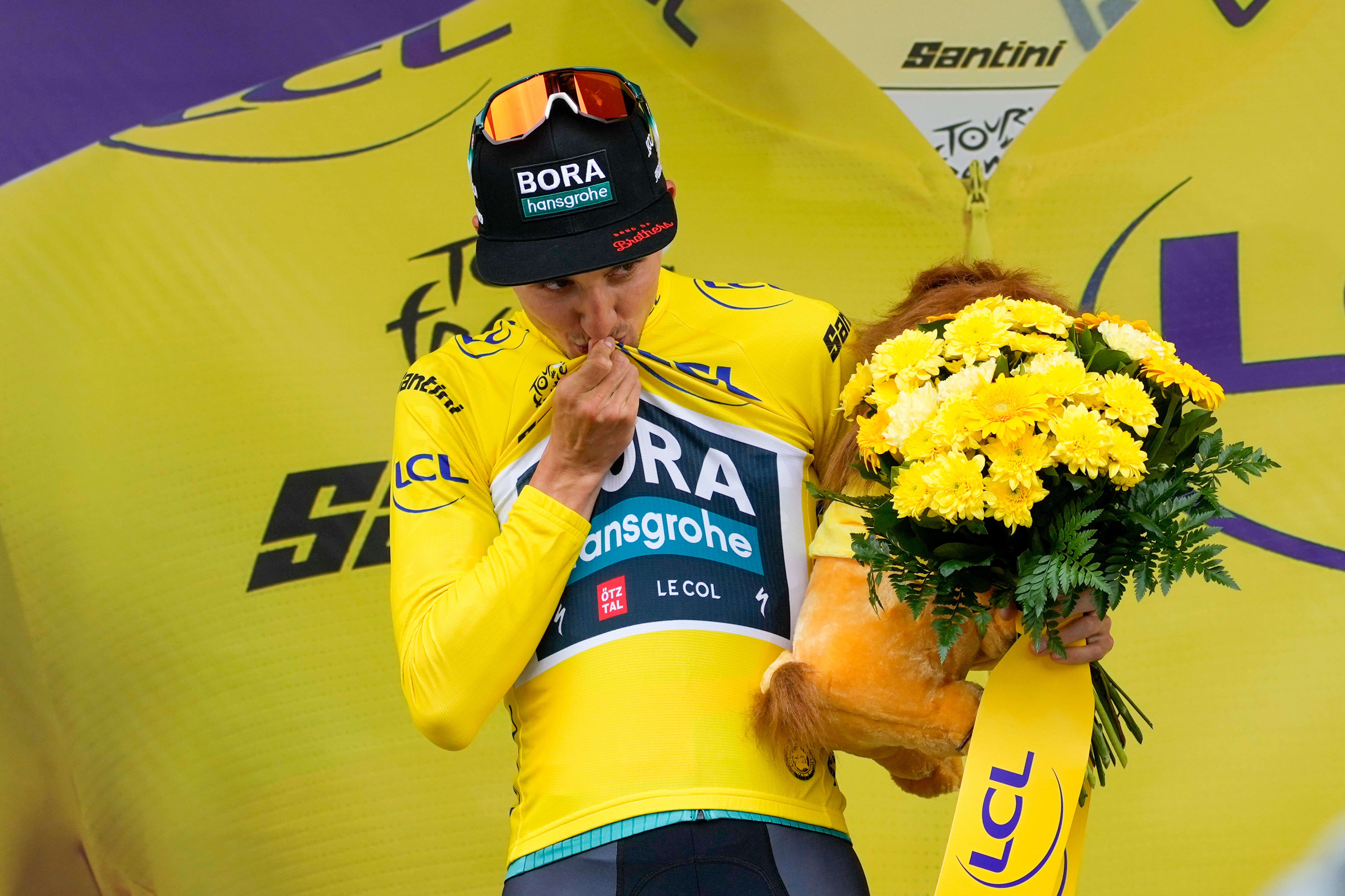 Jai Hindley took the yellow jersey with a breakaway victory on stage five of the Tour de France (Thibault Camus/AP)